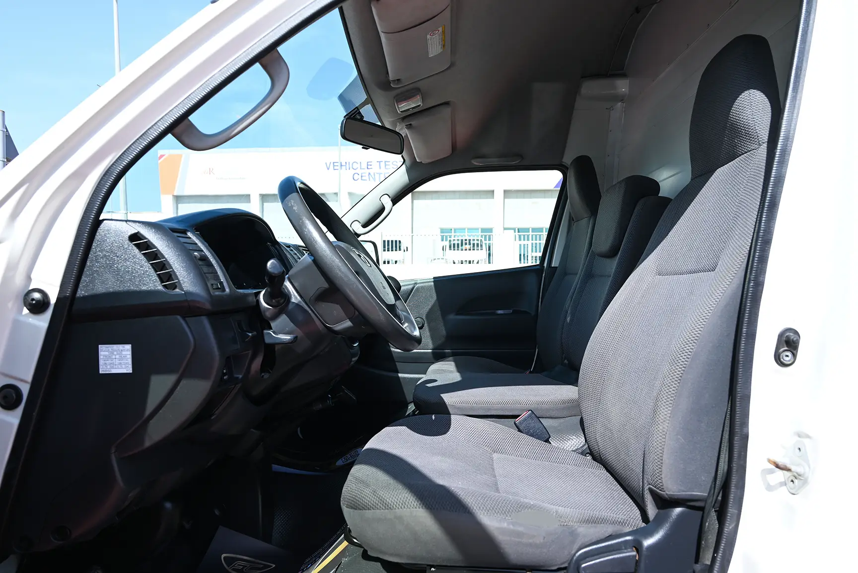 Used 2020 Toyota Hiace GL High Roof White – Front Driver Side Cabin View at First Choice Cars Sharjah