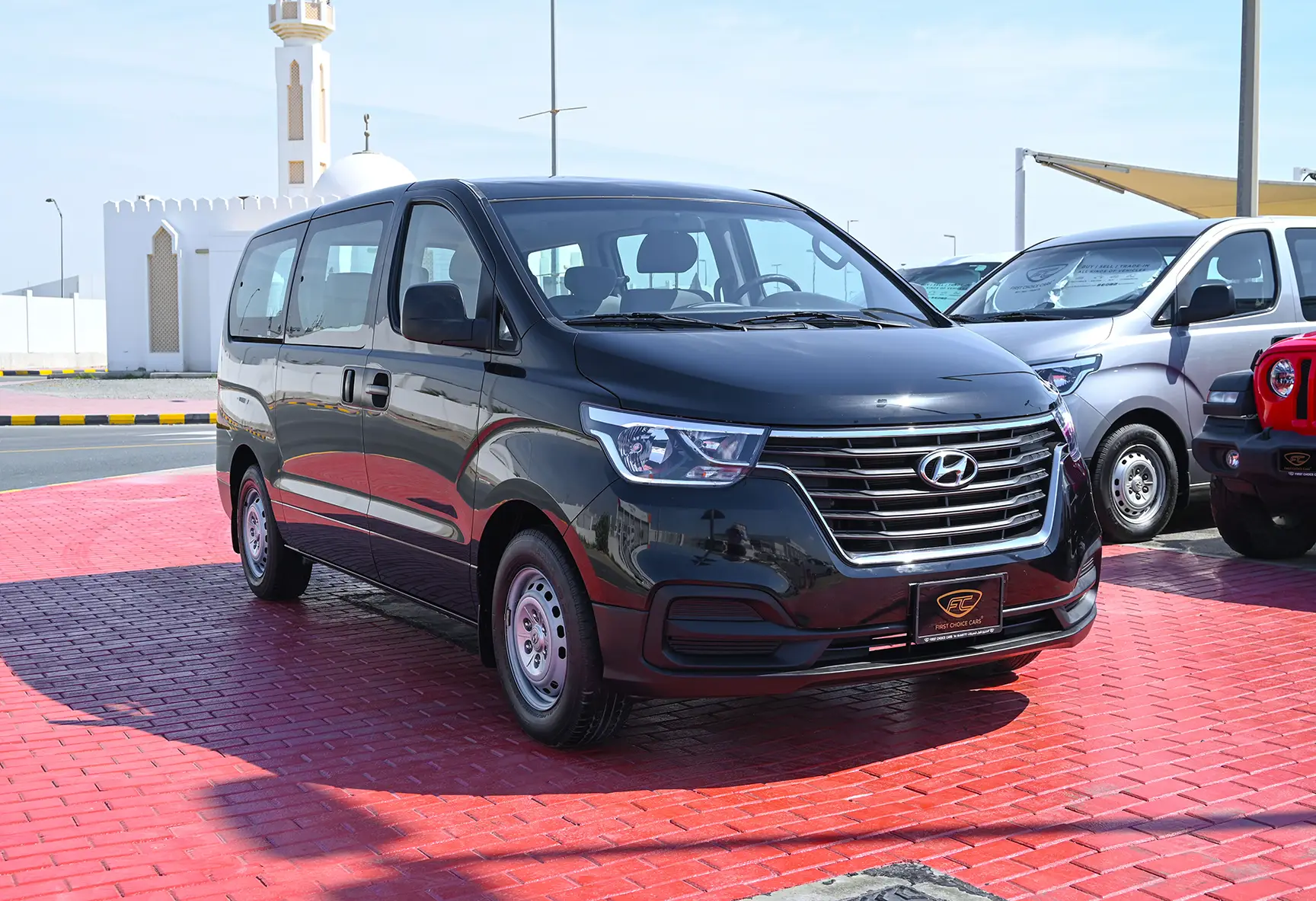 Used 2021 Hyundai H1 12-Seater Wagon Black – Right Front Diagonal (45°) View at First Choice Cars Sharjah