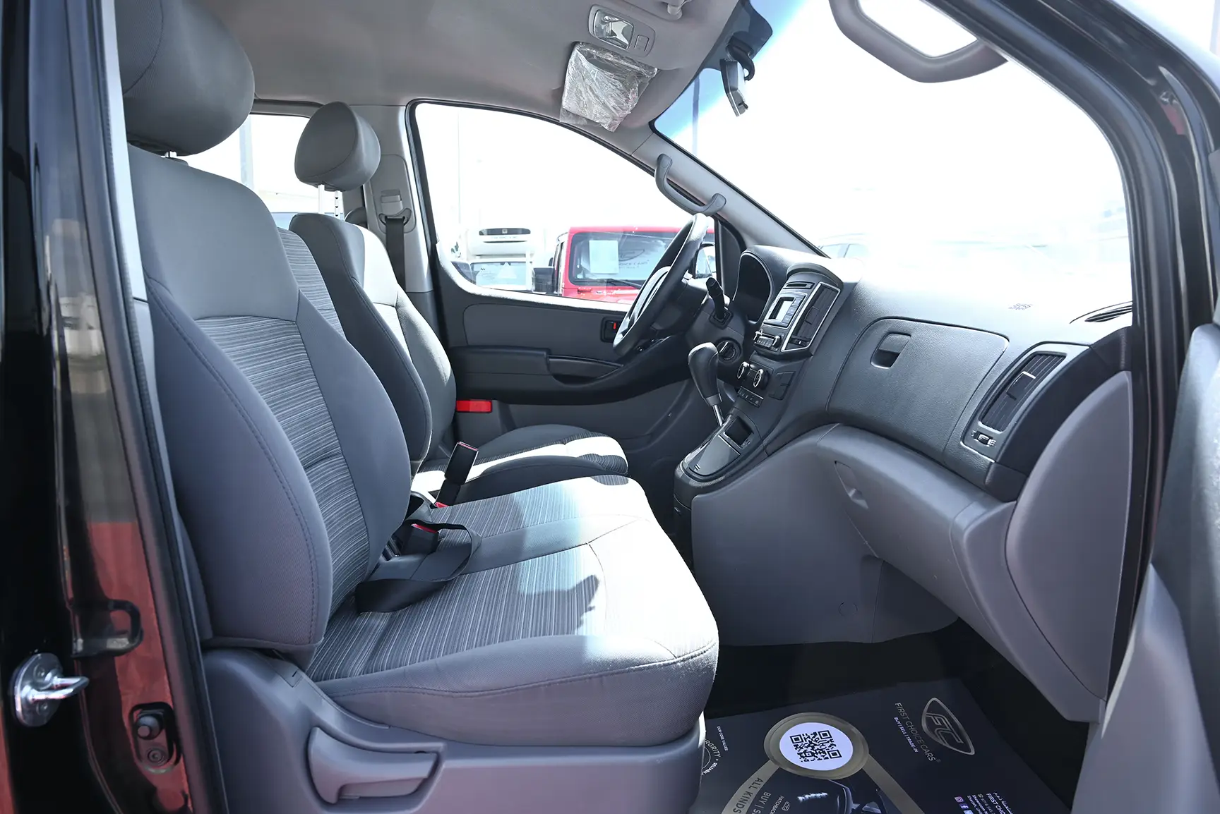 Used 2021 Hyundai H1 12-Seater Wagon Black – Front Passenger Side Cabin View at First Choice Cars Sharjah