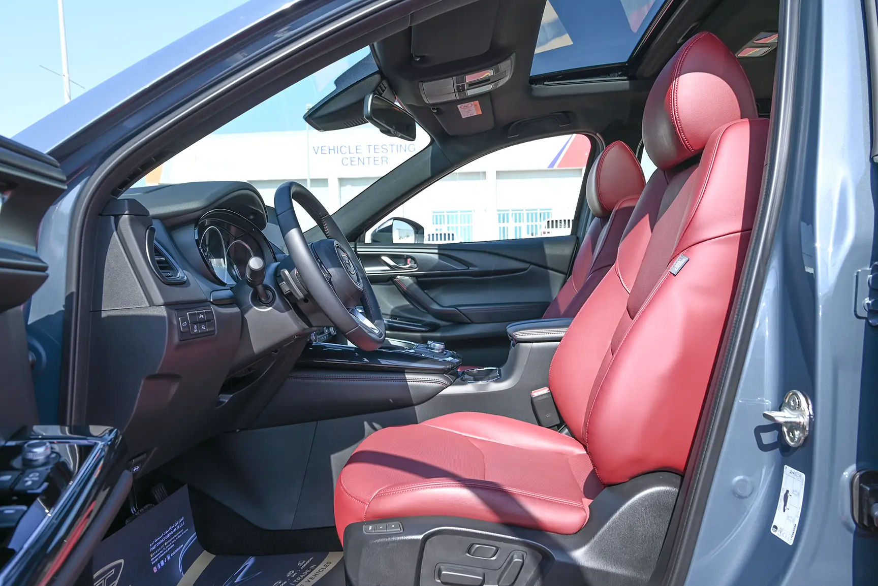 Used 2022 Mazda CX-9 Ignite Edition in Blue – Front Driver Side Cabin View