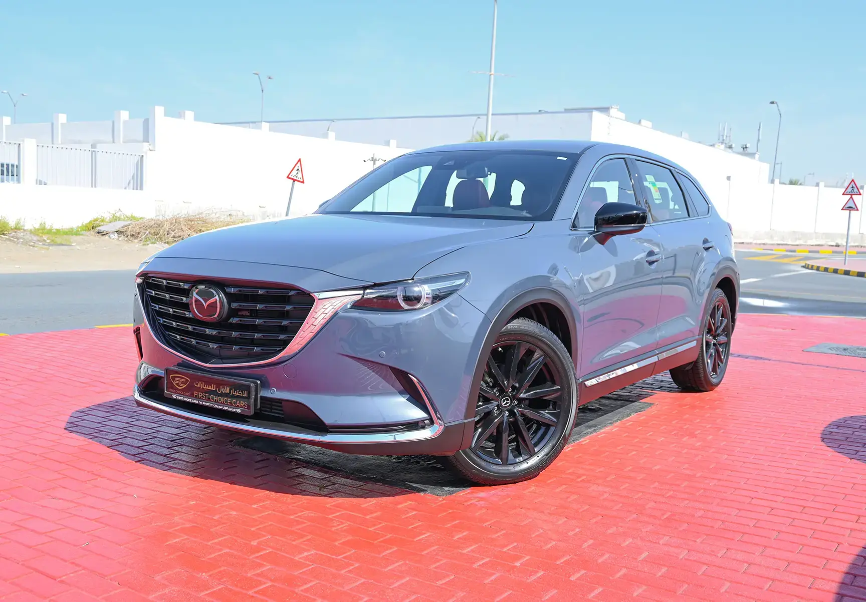 Used 2022 Mazda CX-9 Ignite Edition Blue – Left Front Diagonal (45°) View at First Choice Cars Sharjah