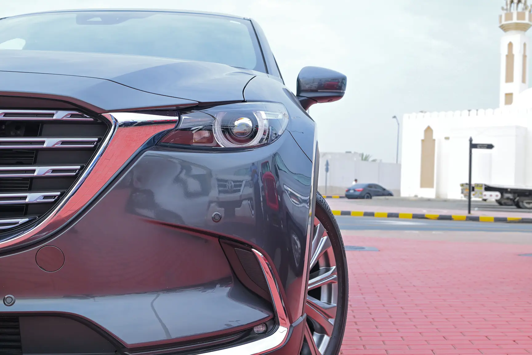 Used 2022 Mazda CX-9 Signature Edition Grey – Headlight Close-up at First Choice Cars Sharjah