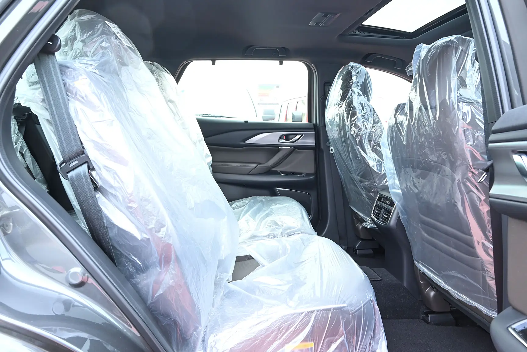 Used 2022 Mazda CX-9 Signature Edition Grey – Rear Passenger Side Cabin View at First Choice Cars Sharjah