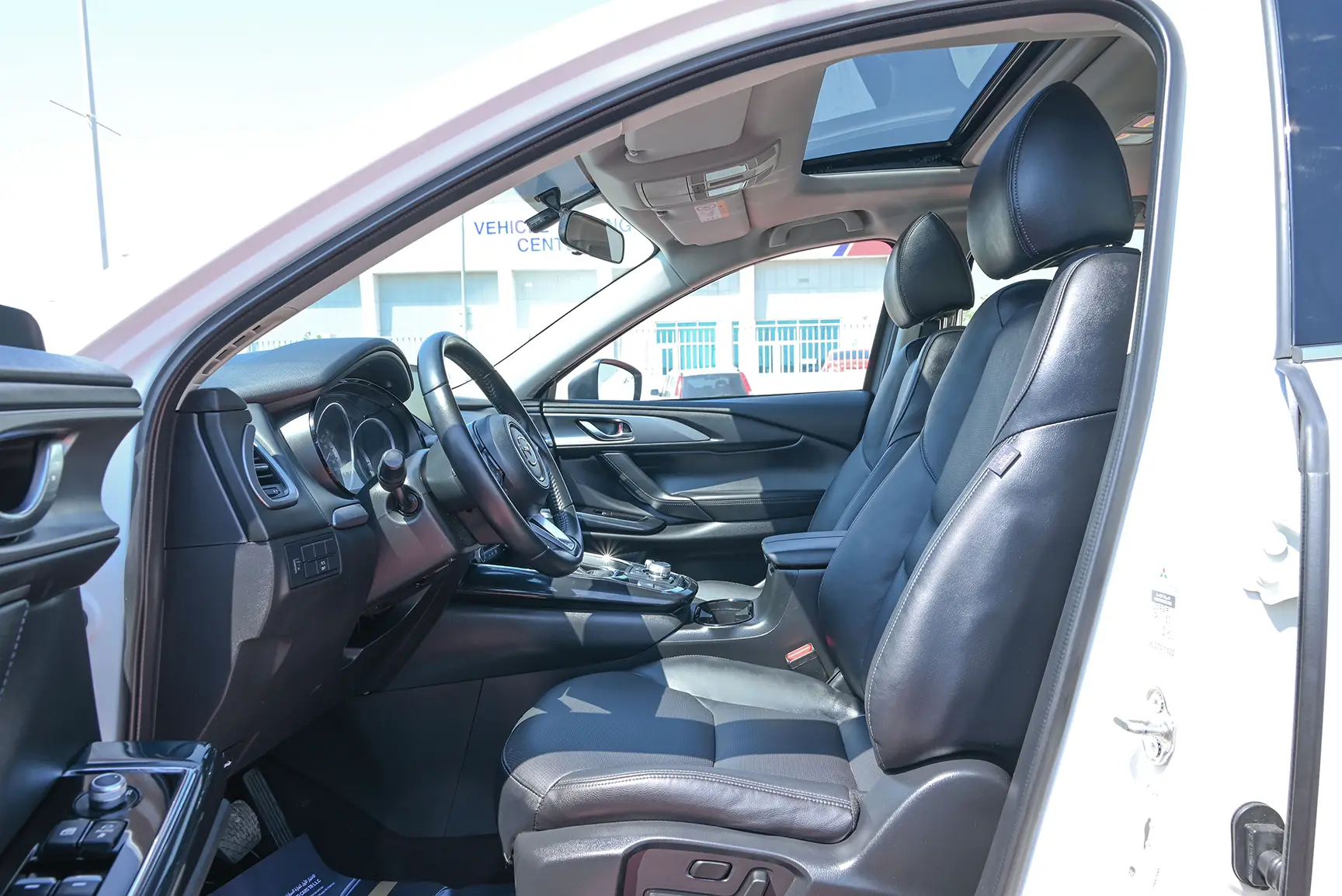 Used 2020 Mazda CX-9 GT White – Front Driver Side Cabin View at First Choice Cars Sharjah