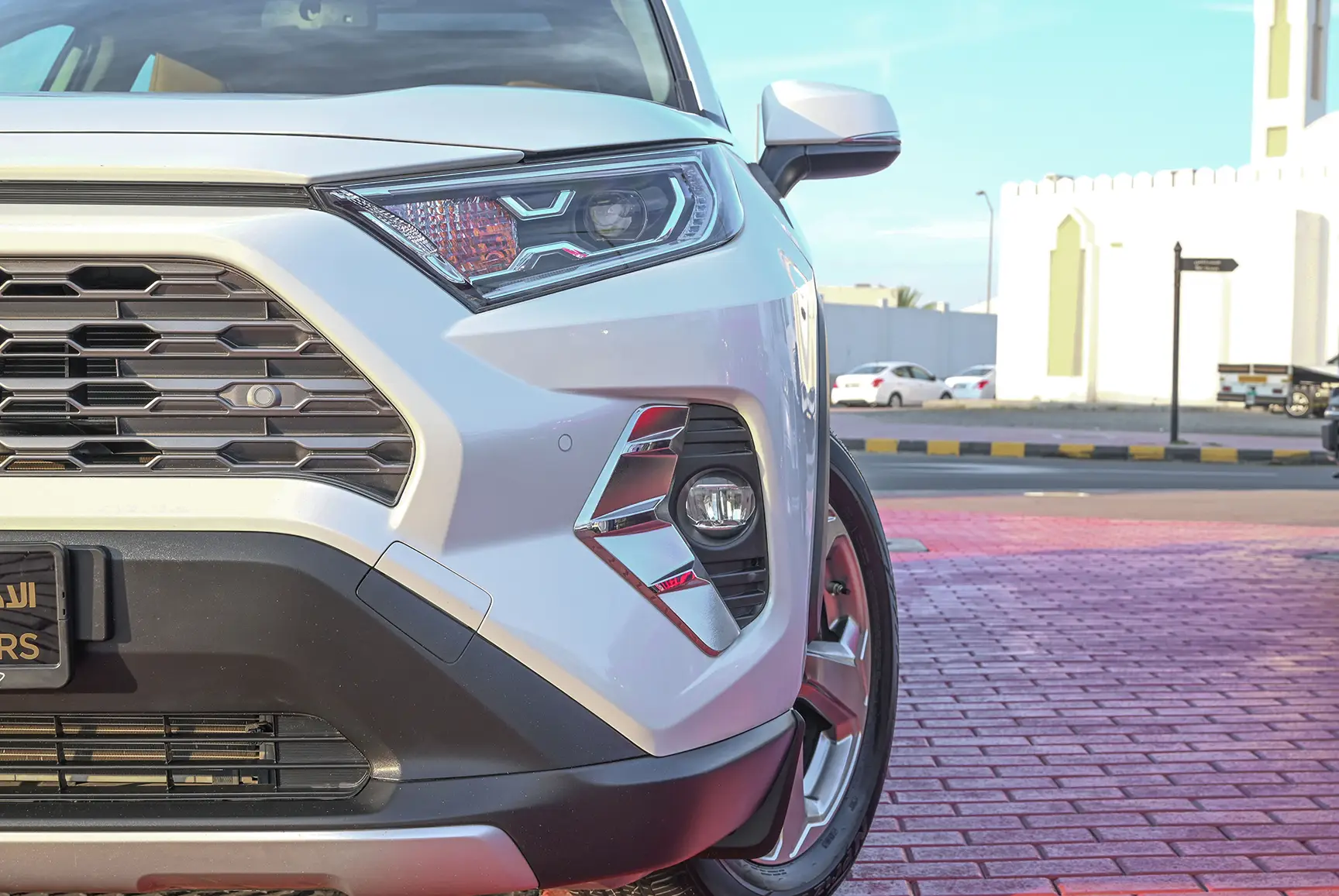Used 2019 Toyota RAV4 VXR in White – Headlight Close-up for Sale at First Choice Cars Dubai Sharjah