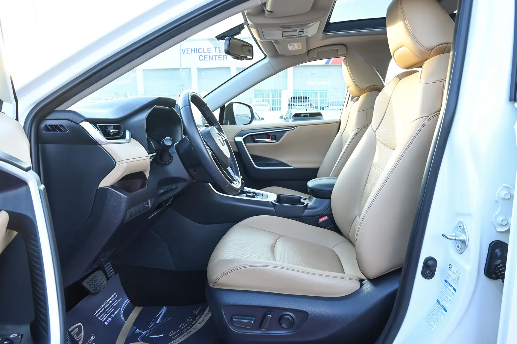 Used 2019 Toyota RAV4 VXR in White – Front Driver Side Cabin View for Sale at First Choice Cars Dubai Sharjah
