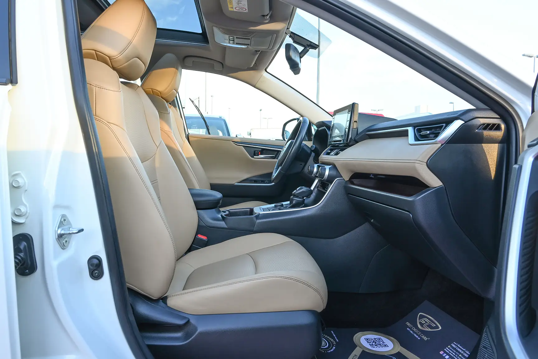 Used 2019 Toyota RAV4 VXR in White – Front Passenger Side Cabin View for Sale at First Choice Cars Dubai Sharjah