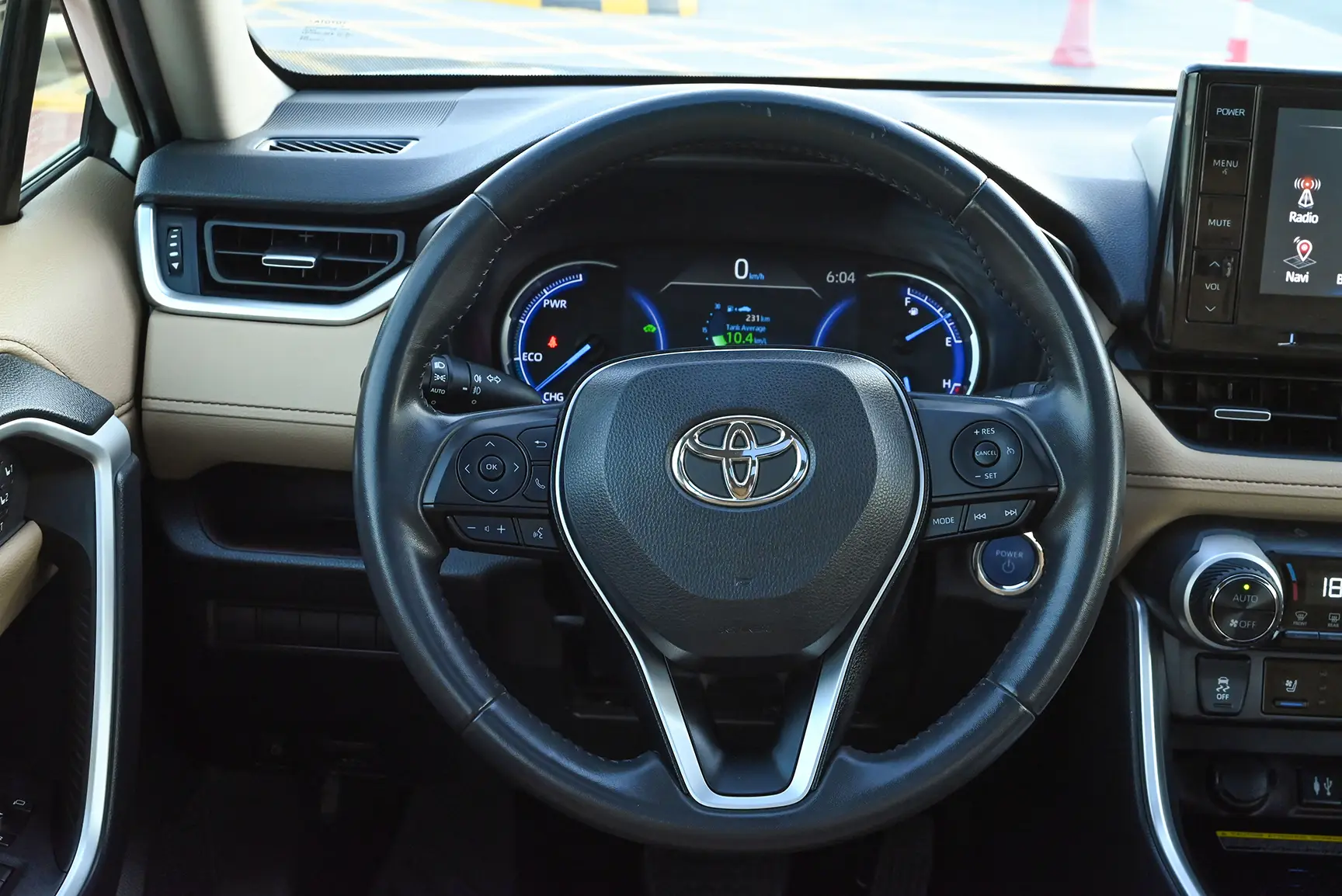 Used 2019 Toyota RAV4 VXR in White – Driver Side Dashboard & Steering View for Sale at First Choice Cars Dubai Sharjah