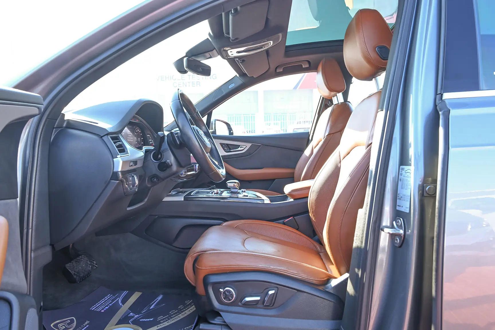 Used 2016 Audi Q7 S-Line Grey – Front Driver Side Cabin View at First Choice Cars Sharjah