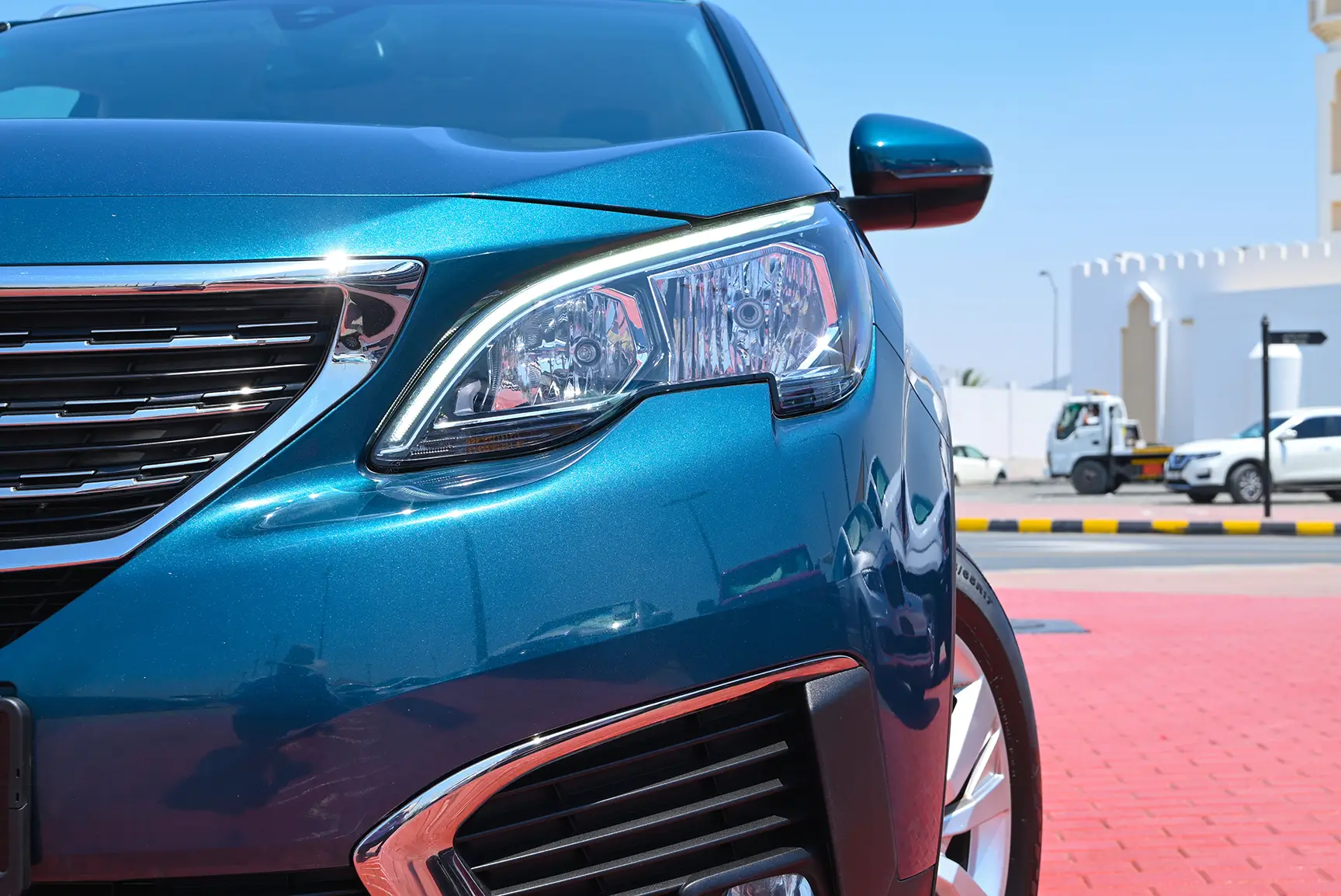 Used 2018 Peugeot 5008 Active Blue – Headlight Close-up at First Choice Cars Sharjah