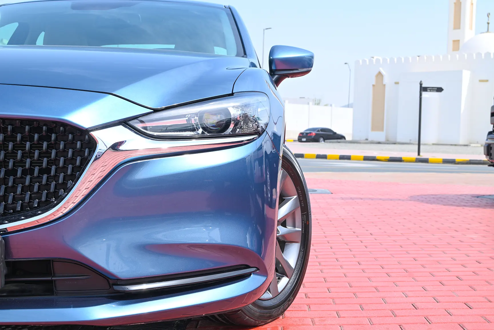 Used 2021 Mazda 6 S Grade Blue – Headlight Close-up at First Choice Cars Sharjah