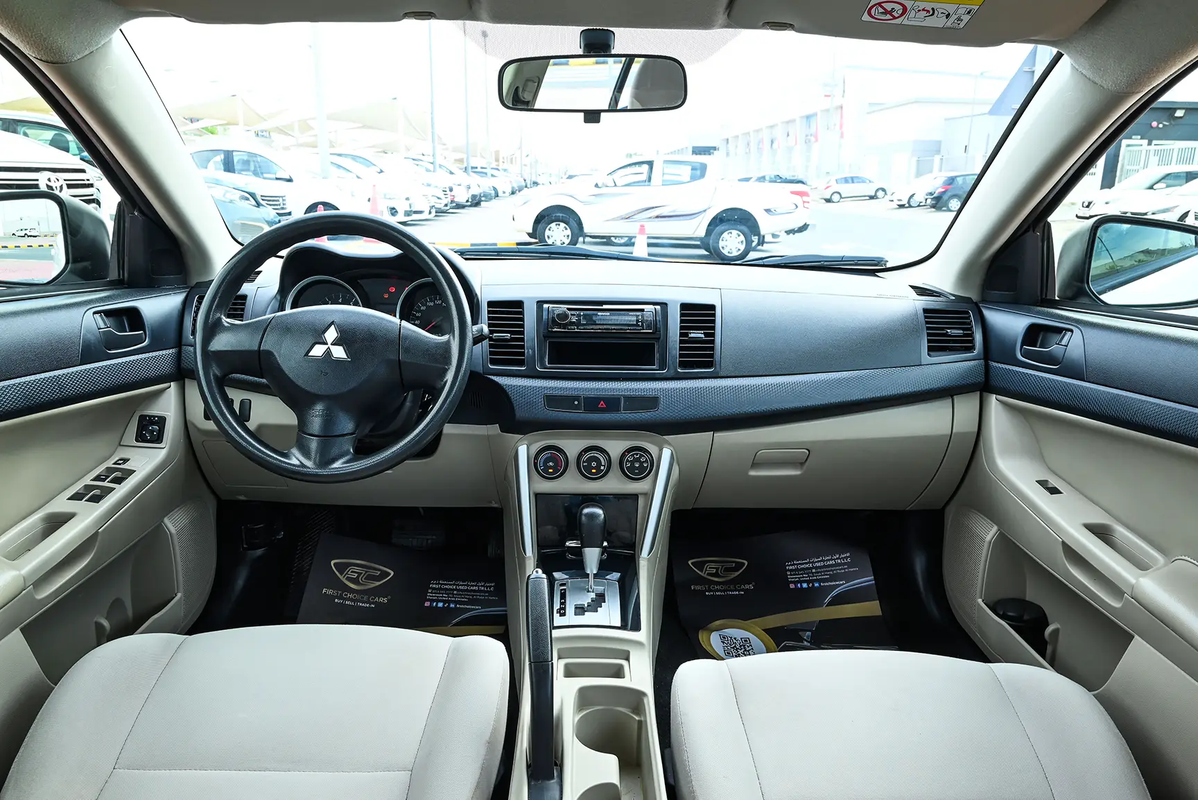 Used 2017 Mitsubishi LANCER EX GLX White – Front Cabin / Dashboard Full View at First Choice Cars Sharjah