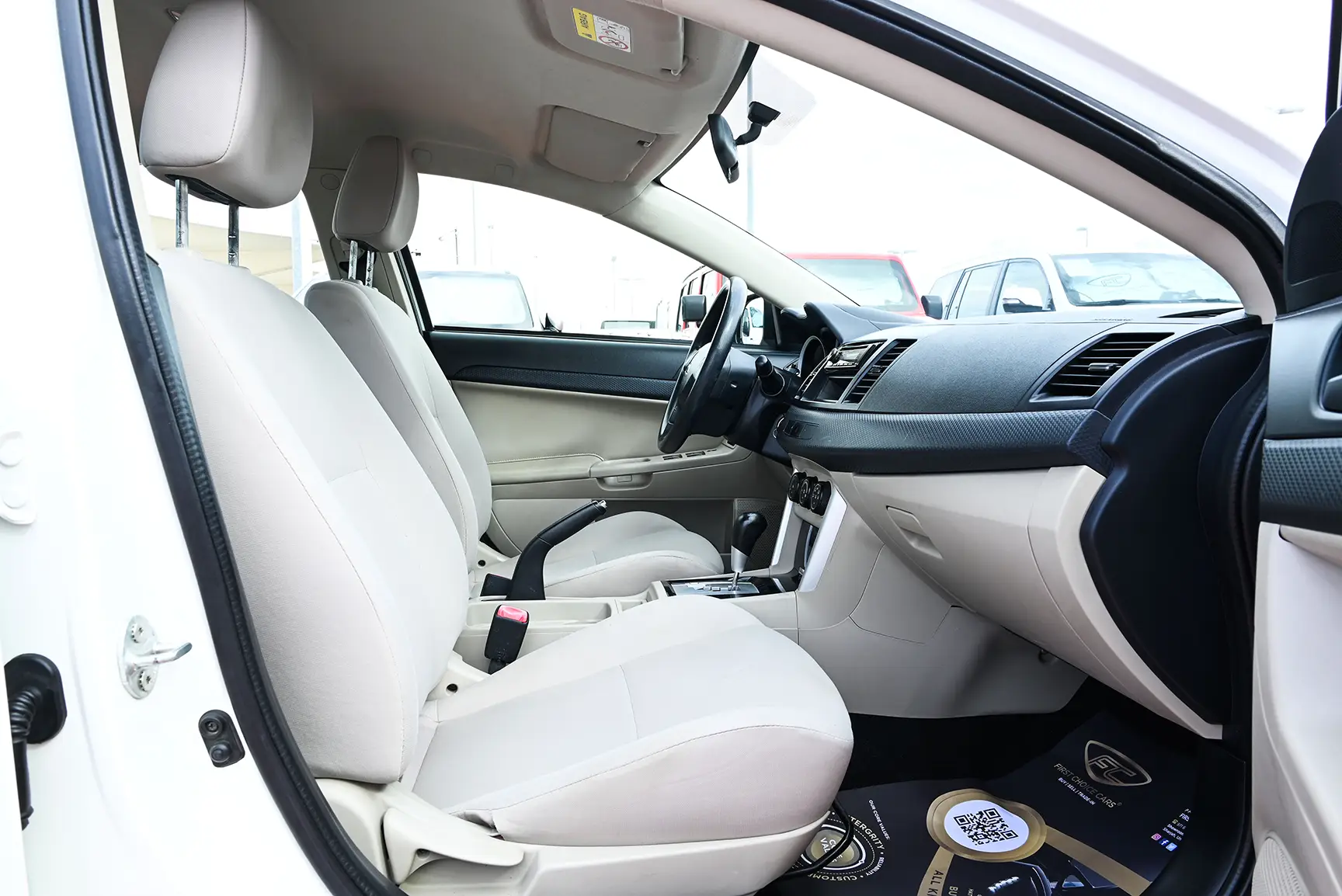 Used 2017 Mitsubishi LANCER EX GLX White – Front Passenger Side Cabin View at First Choice Cars Sharjah