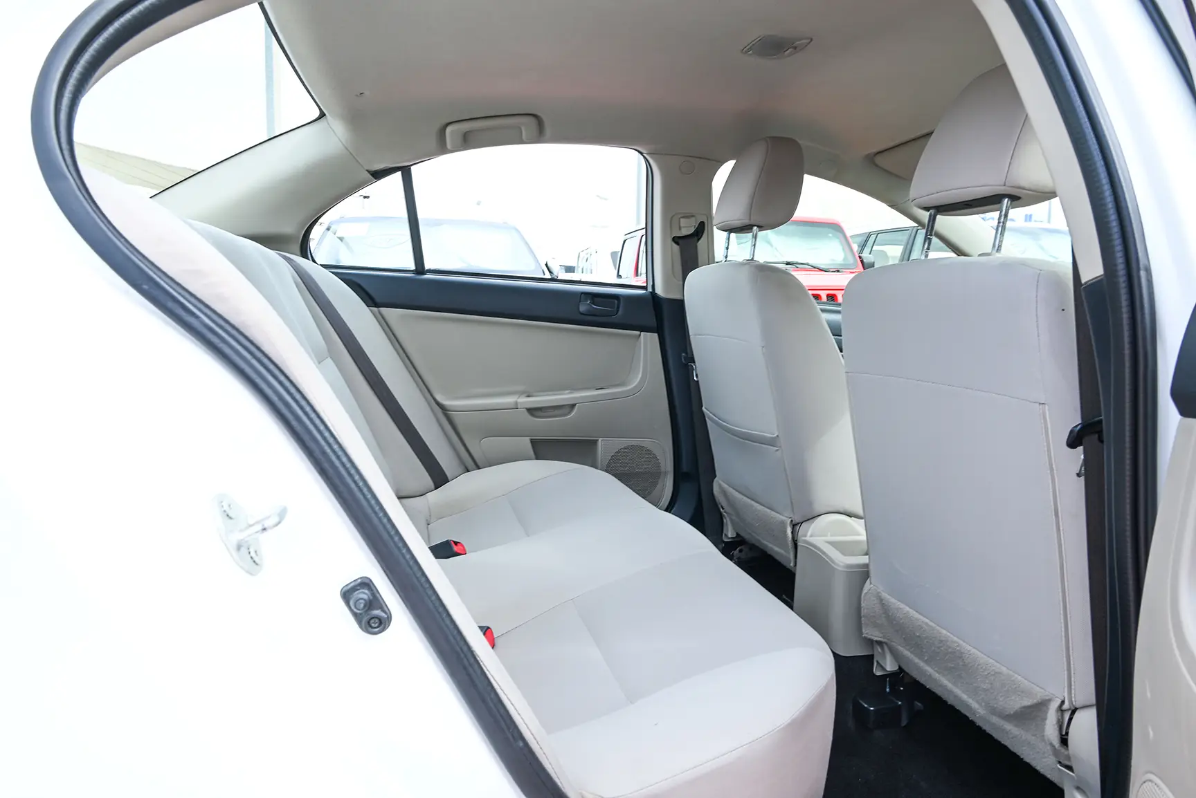 Used 2017 Mitsubishi LANCER EX GLX White – Rear Passenger Side Cabin View at First Choice Cars Sharjah