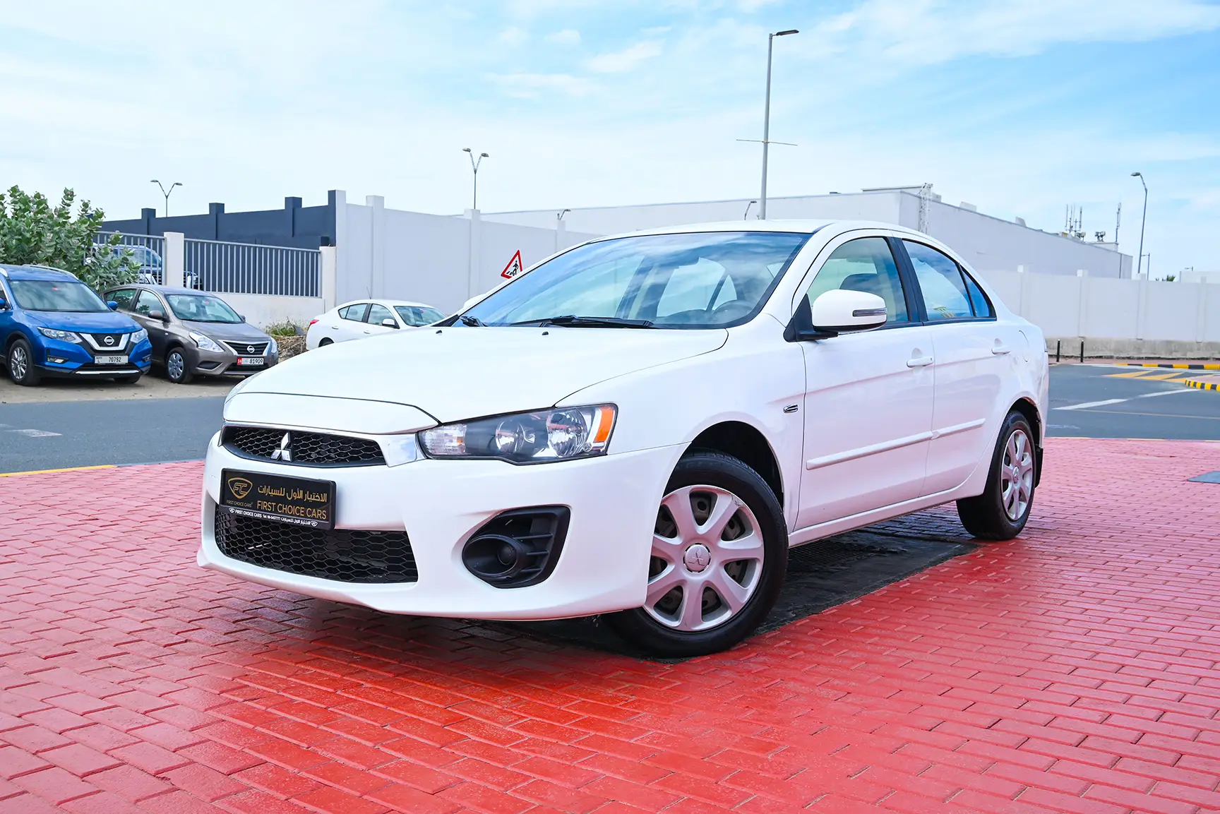 Used 2017 Mitsubishi LANCER EX GLX White – Left Front Diagonal (45°) View at First Choice Cars Sharjah