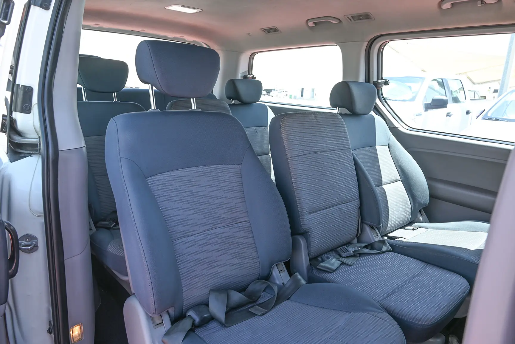 Used 2018 Hyundai H1 12-Seater Wagon White – Rear Passenger Side Cabin View at First Choice Cars Sharjah