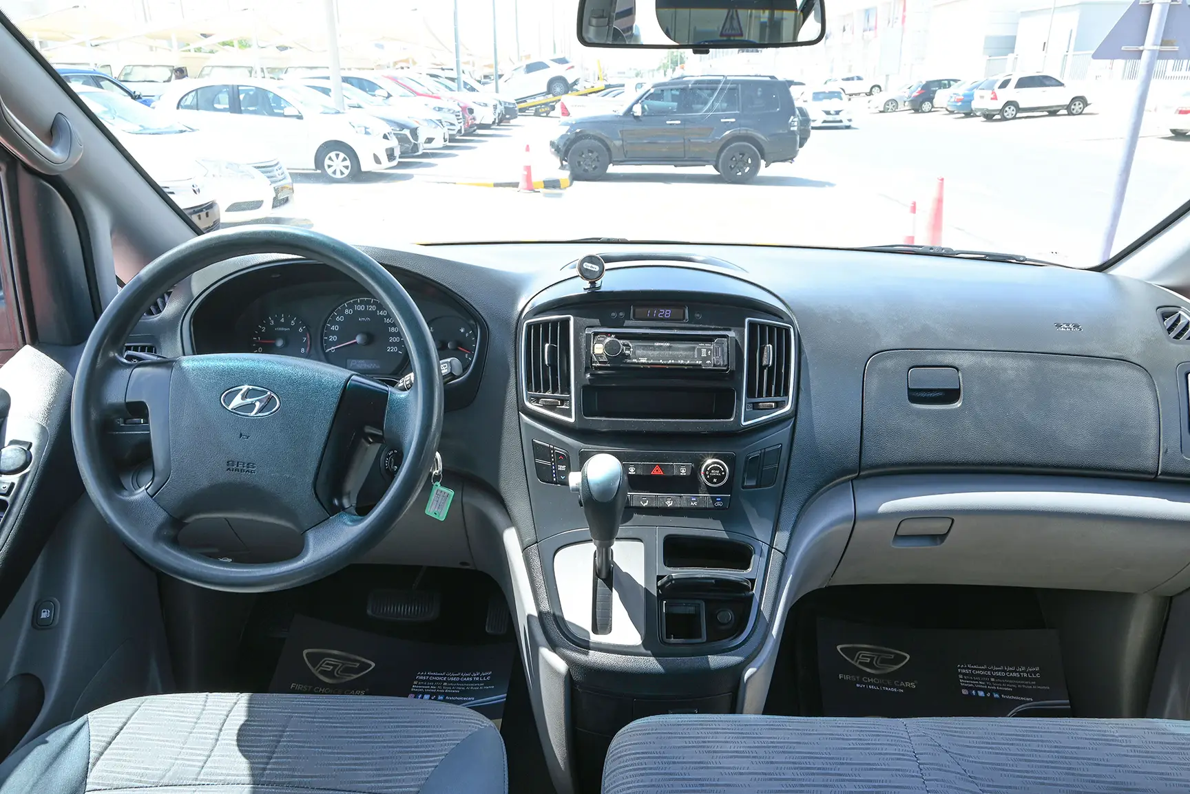 Used 2018 Hyundai H1 12-Seater Wagon White – Front Driver Side Cabin View at First Choice Cars Sharjah