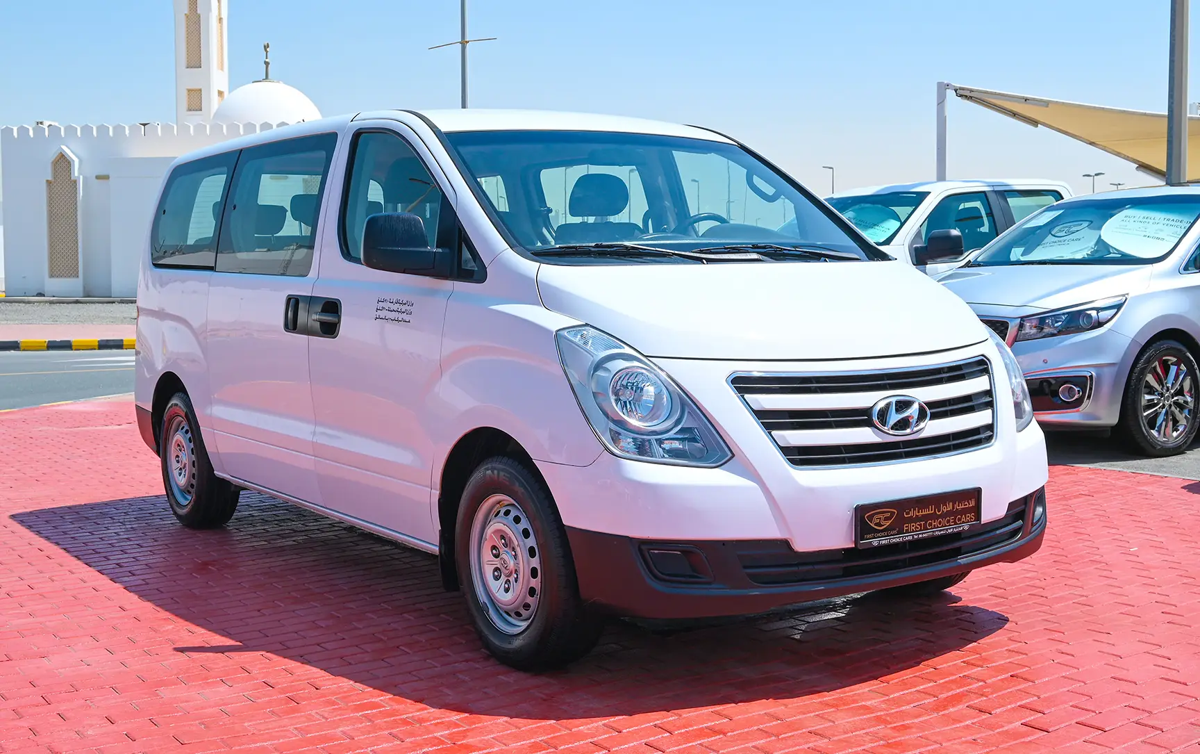 Used 2018 Hyundai H1 12-Seater Wagon White – Right Front Diagonal (45°) View at First Choice Cars Sharjah