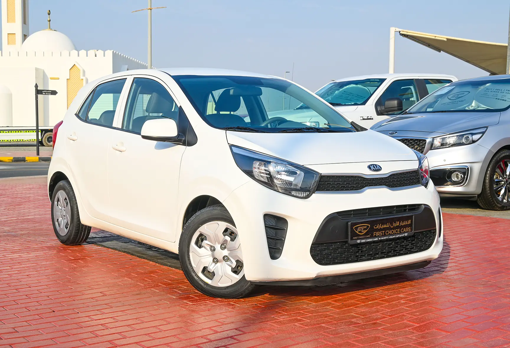 Used 2020 Kia Picanto EX in White – Right Front Diagonal (45°) View for Sale at First Choice Cars Dubai Sharjah