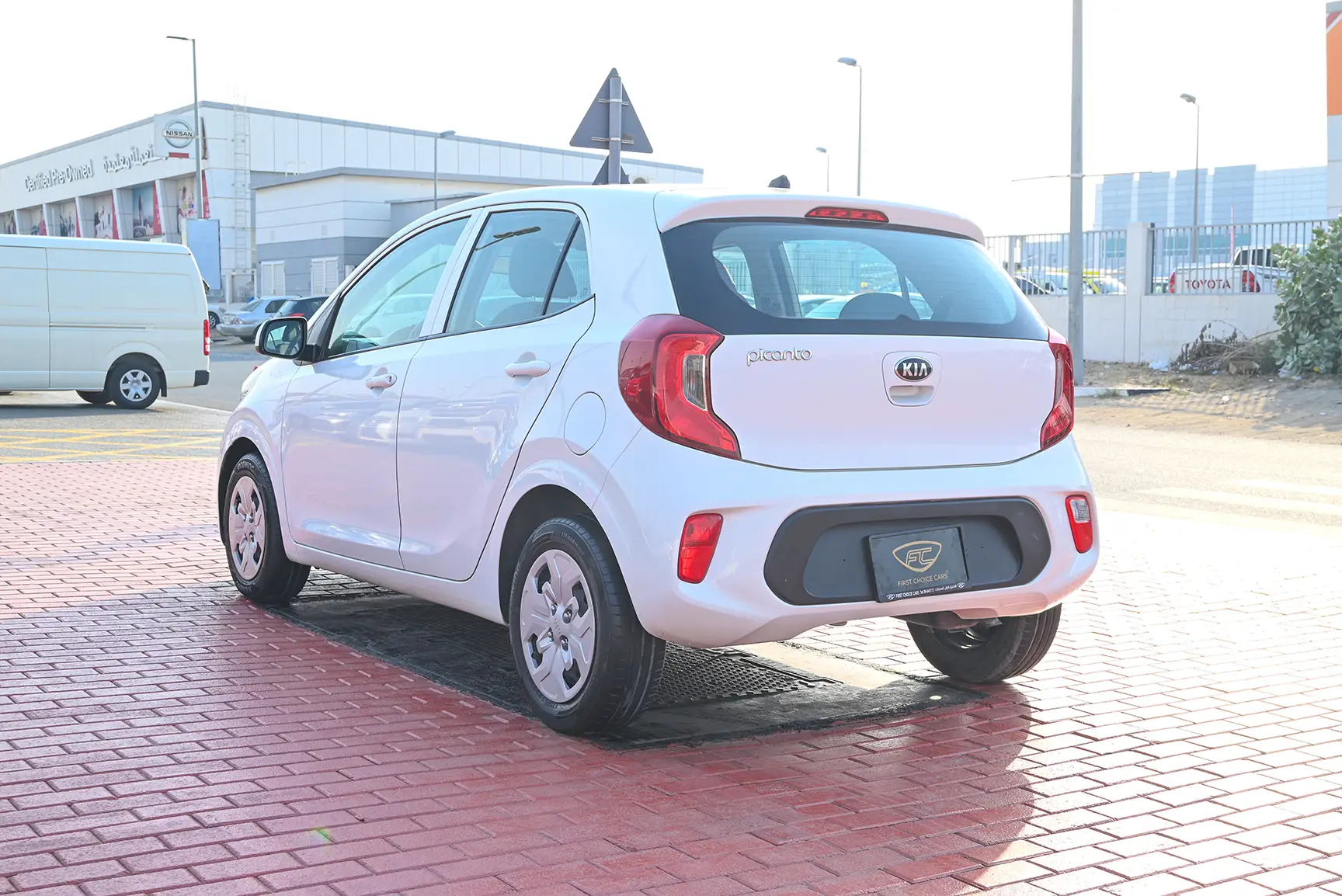 Used 2020 Kia Picanto EX in White – Left Back Diagonal (45°) View for Sale at First Choice Cars Dubai Sharjah