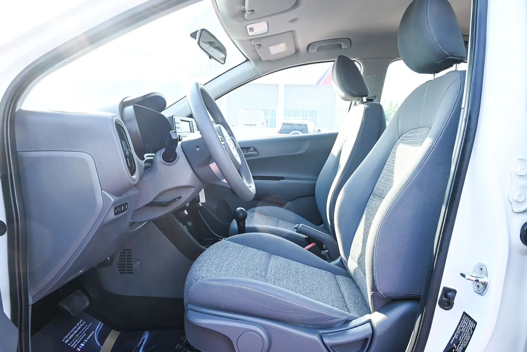 Used 2020 KIA Picanto Ex White – Front Driver Side Cabin View at First Choice Cars Sharjah