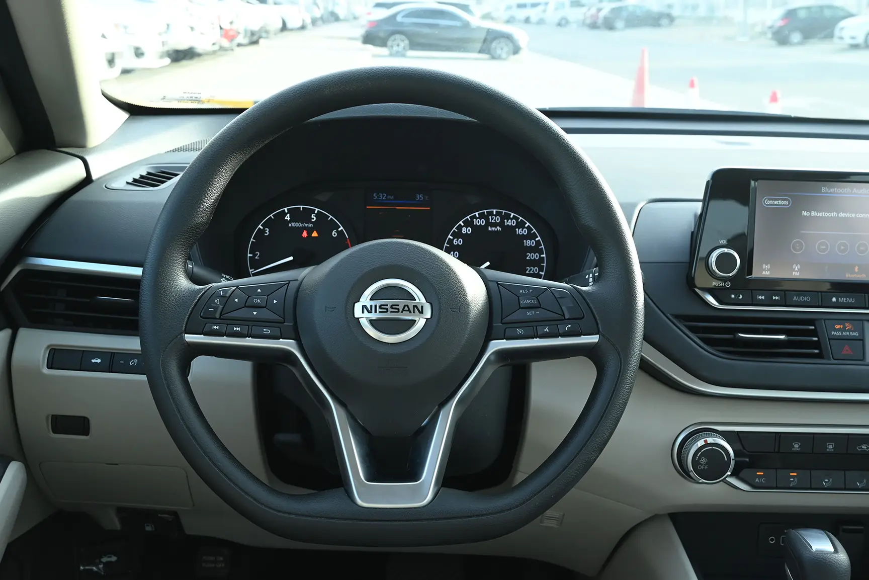 Used 2022 Nissan Altima S White – Driver Side Dashboard & Steering View at First Choice Cars Sharjah