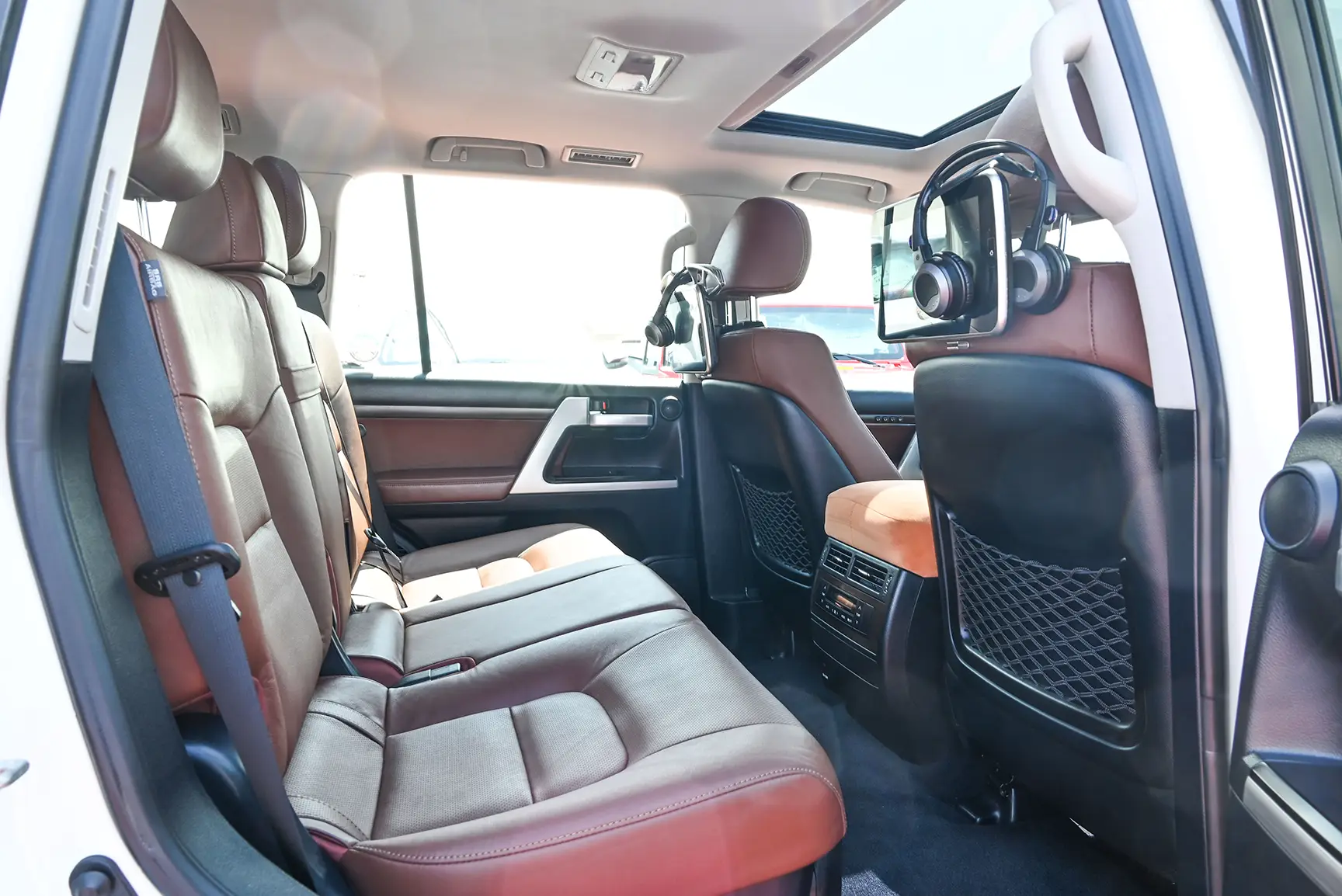 Used 2017 Toyota Land Cruiser VXR White – Rear Passenger Side Cabin View at First Choice Cars Sharjah