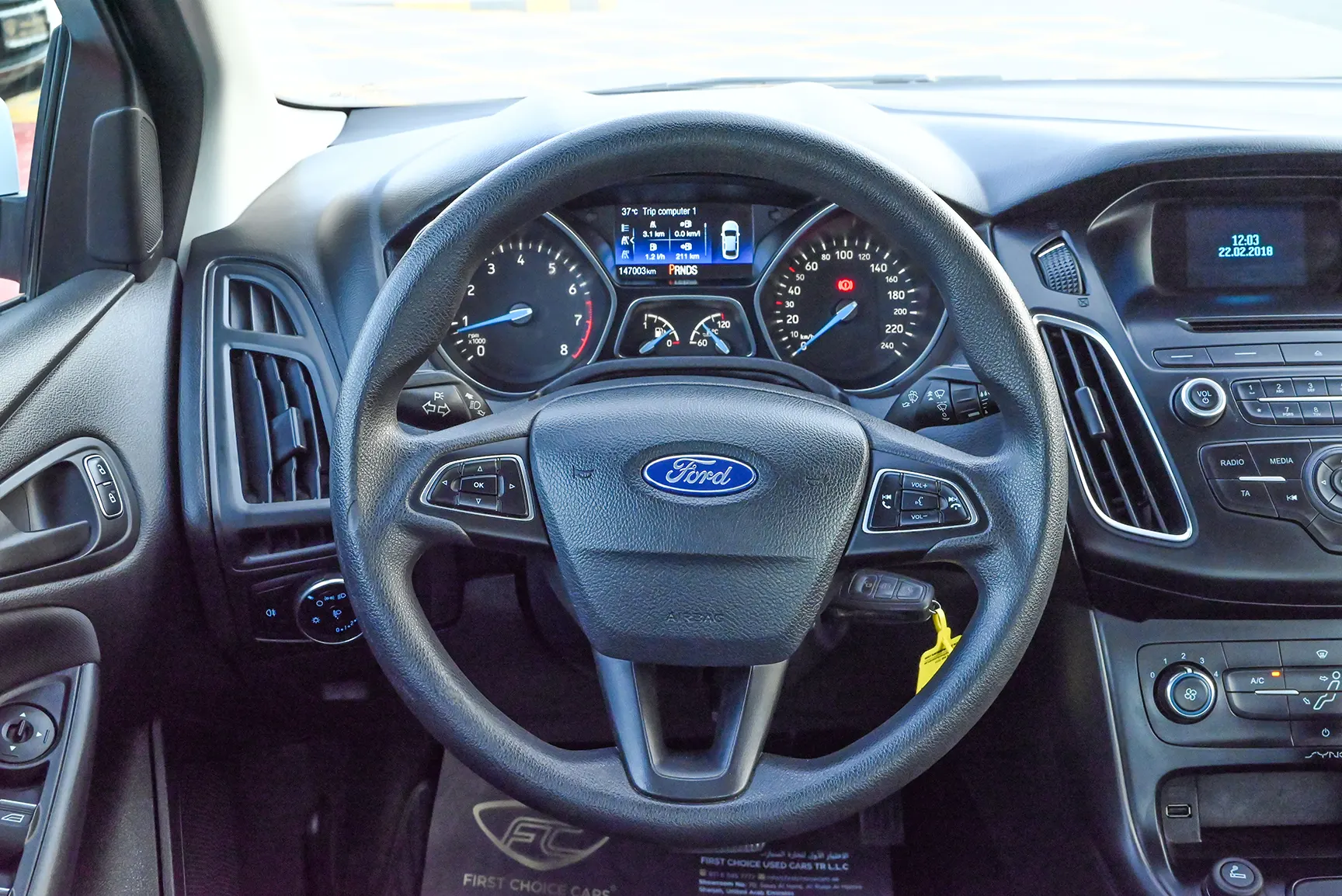 Used 2018 Ford Focus S White – Driver Side Dashboard & Steering View at First Choice Cars Sharjah