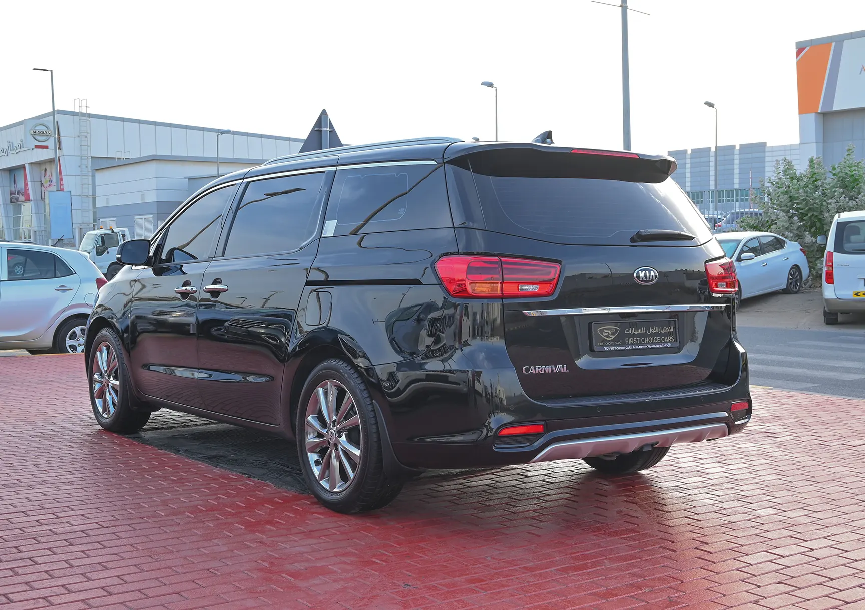 Used 2019 KIA Carnival Ex Black – Left Back Diagonal (45°) View at First Choice Cars Sharjah