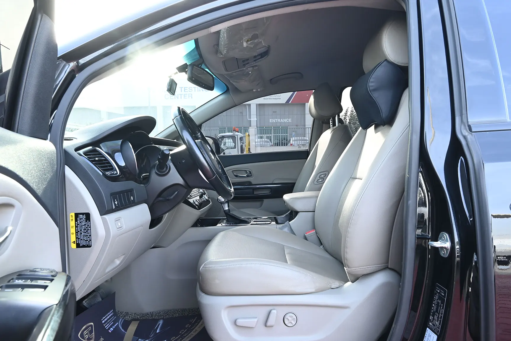 Used 2019 KIA Carnival Ex Black – Front Driver Side Cabin View at First Choice Cars Sharjah