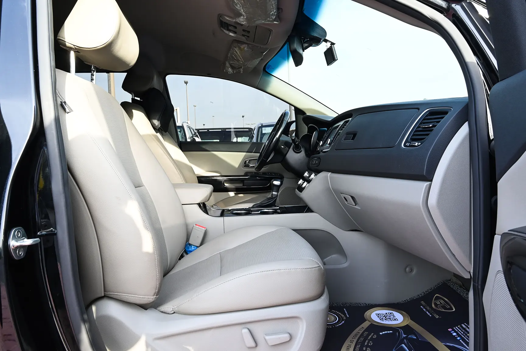 Used 2019 KIA Carnival Ex Black – Front Passenger Side Cabin View at First Choice Cars Sharjah