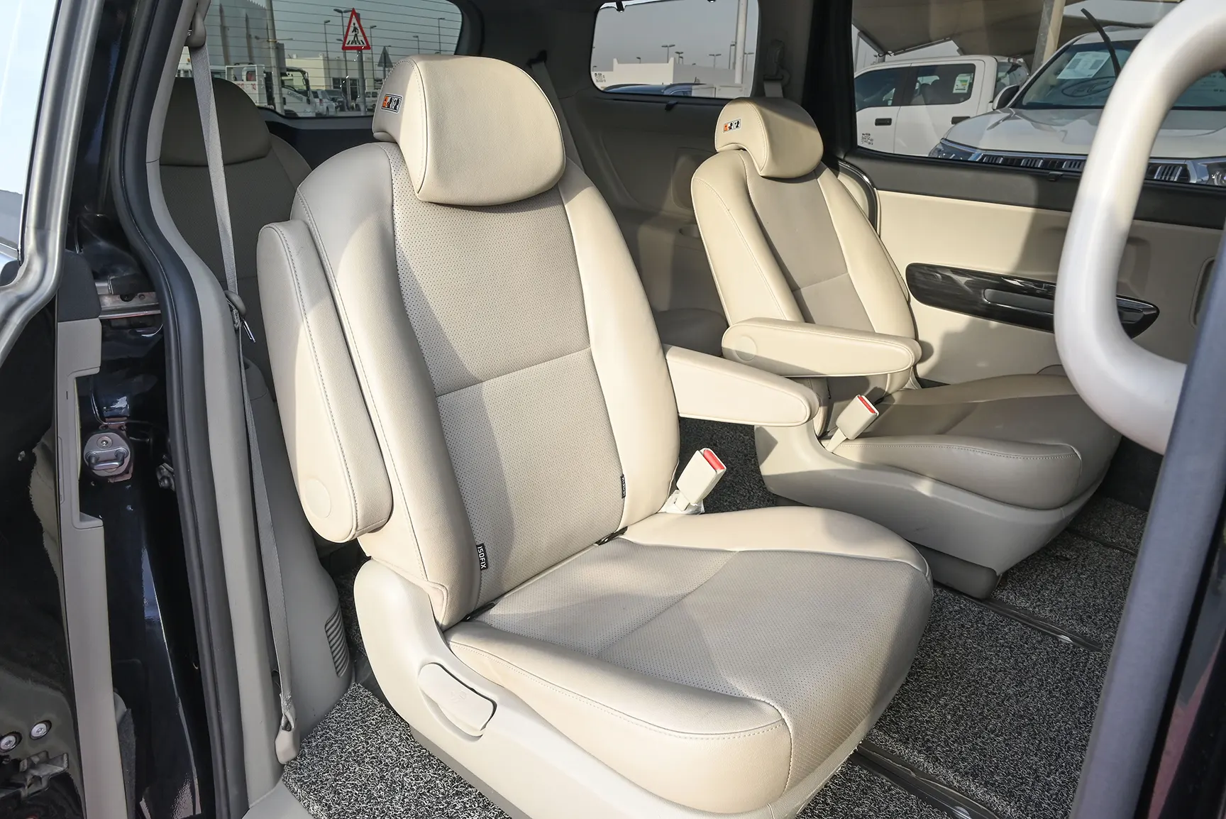 Used 2019 KIA Carnival Ex Black – Rear Passenger Side Cabin View at First Choice Cars Sharjah