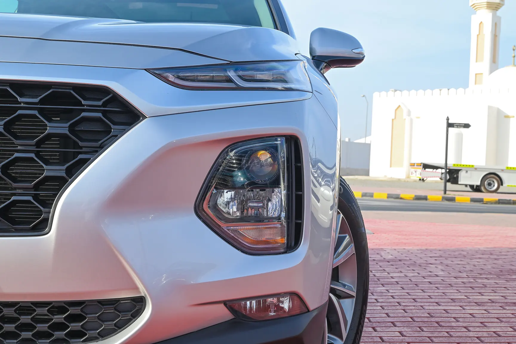 Used 2020 Hyundai Santa Fe GLS Silver – Headlight Close-up at First Choice Cars Sharjah