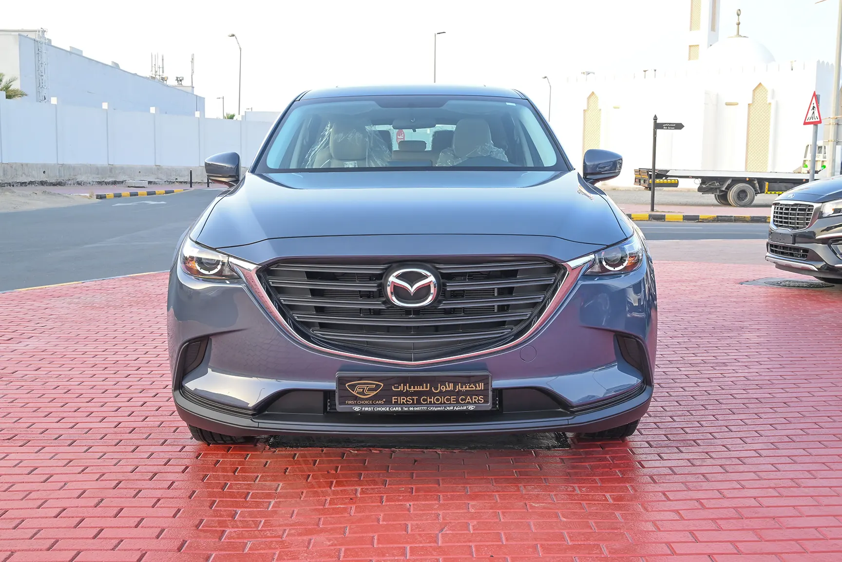 Used 2022 Mazda CX-9 GT Blue – Front View at First Choice Cars Sharjah