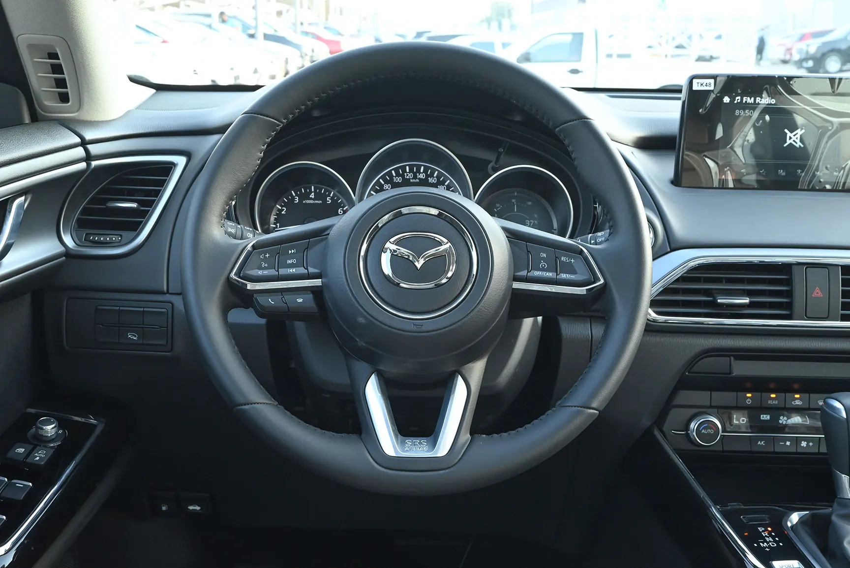 Used 2022 Mazda CX-9 GT Blue – Driver Side Dashboard & Steering View at First Choice Cars Sharjah