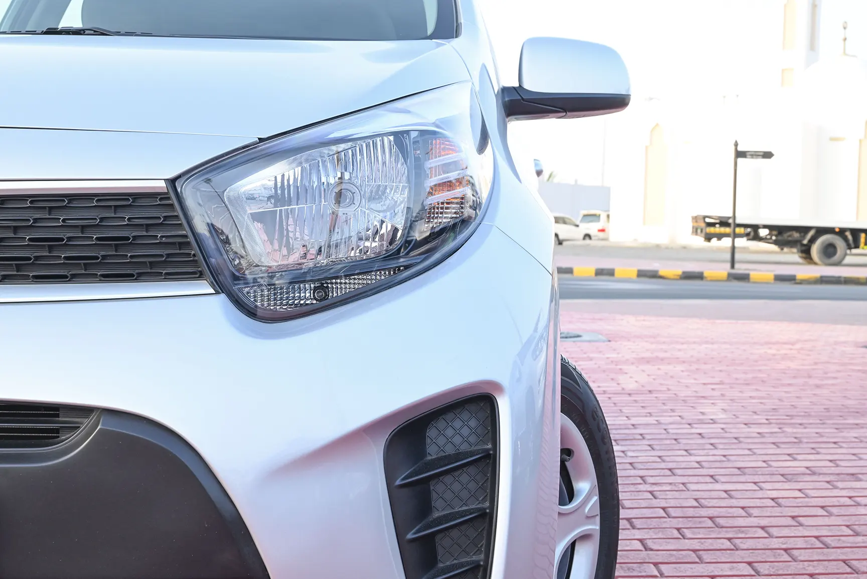 Used 2020 KIA Picanto Ex Silver – Headlight Close-up at First Choice Cars Sharjah