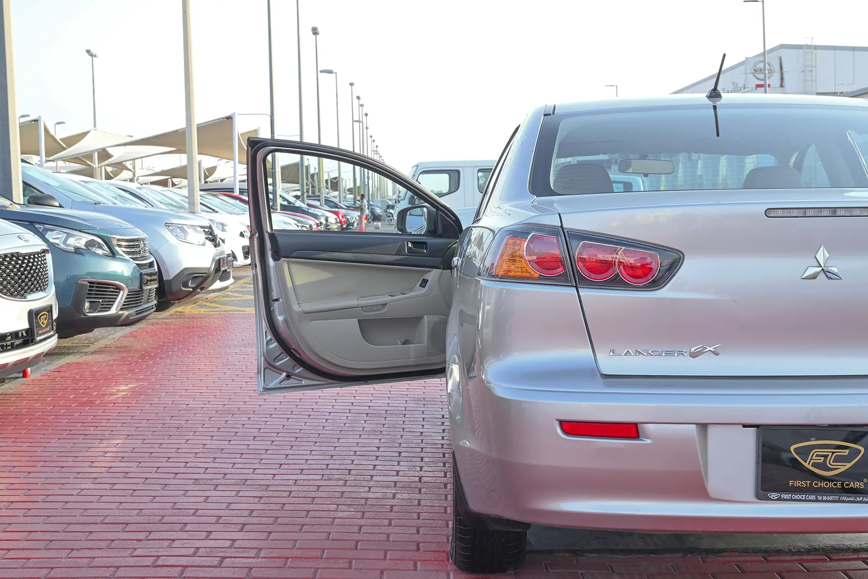 Used 2017 Mitsubishi LANCER EX GLS White – Taillight Close-up at First Choice Cars Sharjah