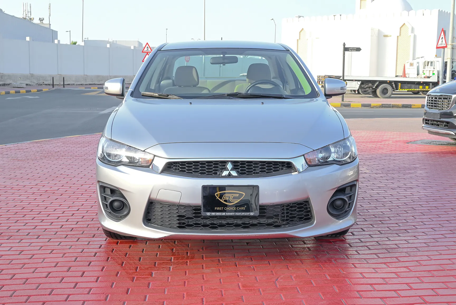 Used 2017 Mitsubishi LANCER EX GLS White – Front View at First Choice Cars Sharjah