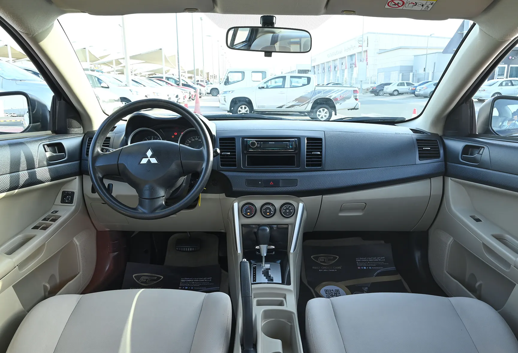 Used 2017 Mitsubishi LANCER EX GLS White – Front Cabin / Dashboard Full View at First Choice Cars Sharjah