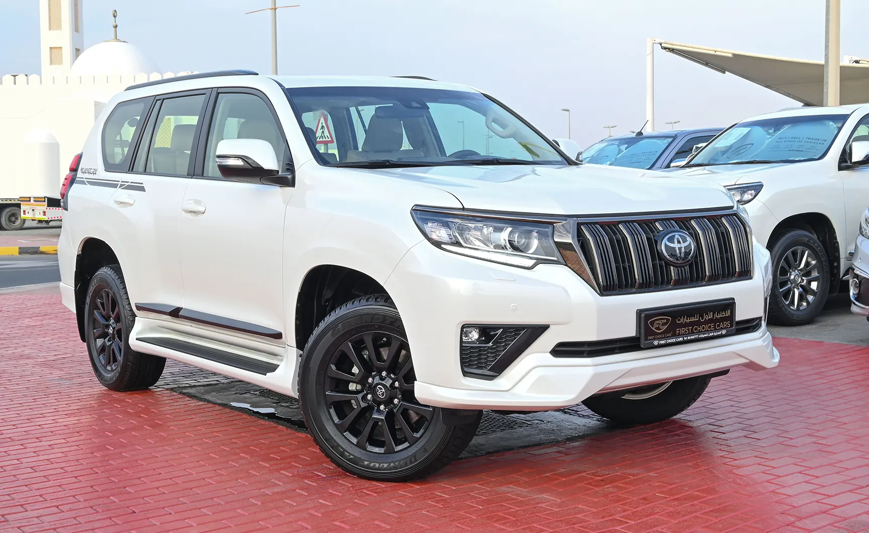 Used 2022 Toyota Prado Adventure White – Right Front Diagonal (45°) View at First Choice Cars Sharjah