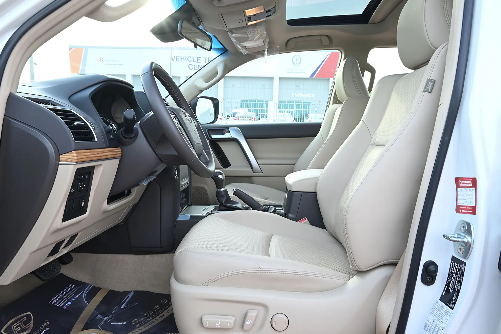 Used 2022 Toyota Prado Adventure White – Front Driver Side Cabin View at First Choice Cars Sharjah