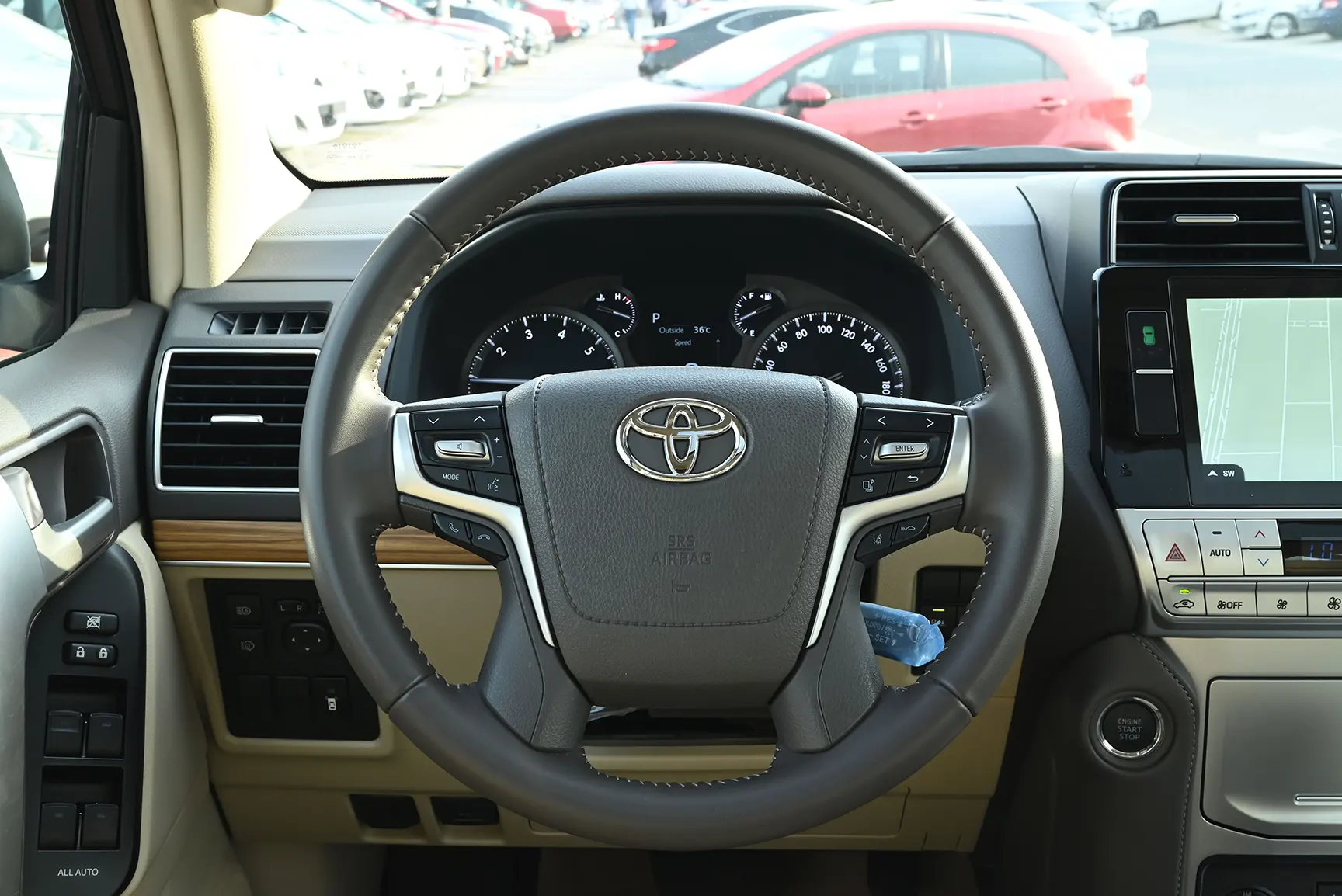 Used 2022 Toyota Prado Adventure White – Driver Side Dashboard & Steering View at First Choice Cars Sharjah