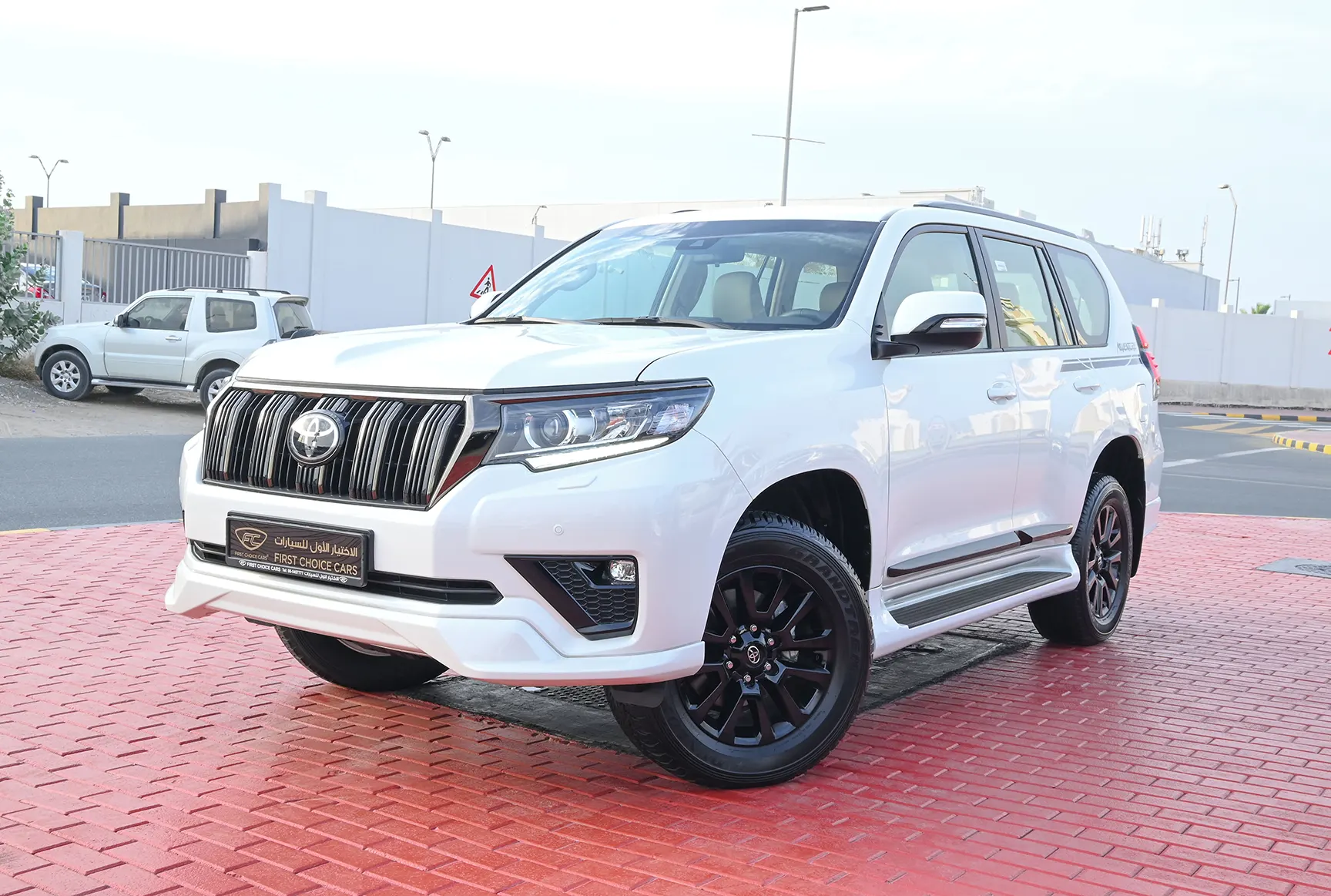 Used 2022 Toyota Prado Adventure White – Left Front Diagonal (45°) View at First Choice Cars Sharjah