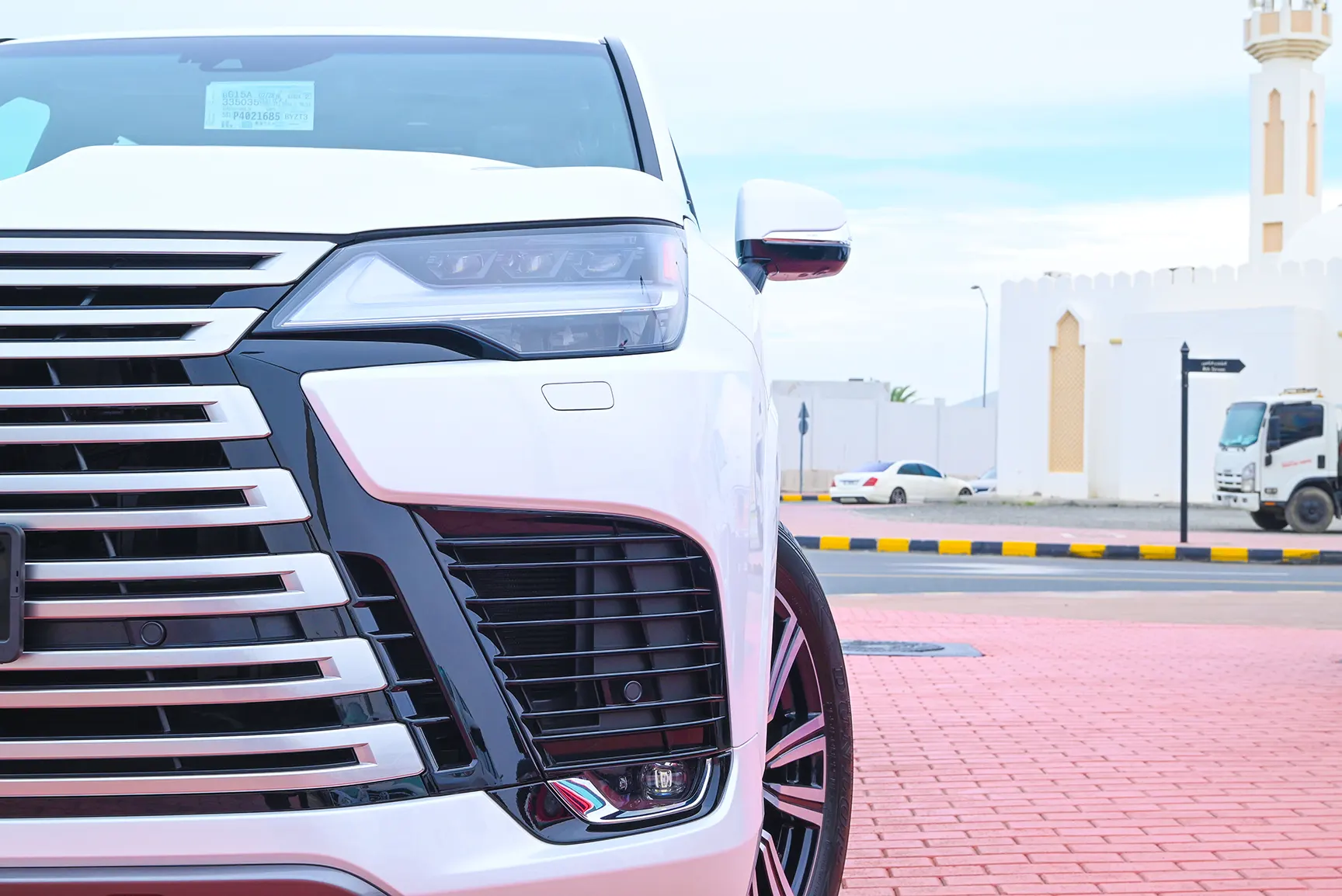 Used 2023 Lexus LX 600 Signature in White – Headlight Close-up