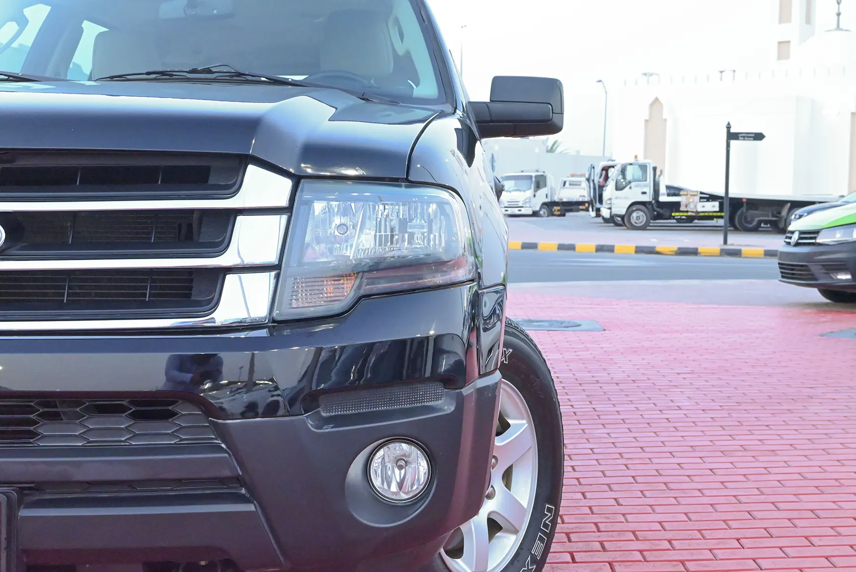 Used 2016 Ford Expedition XL Black – Headlight Close-up at First Choice Cars Sharjah