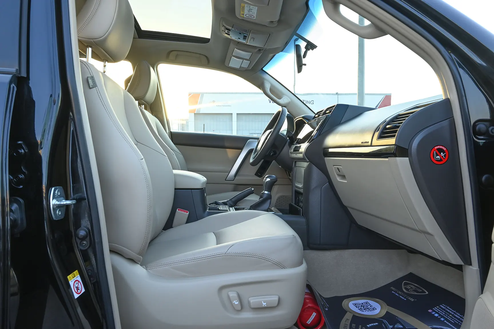 Used 2019 Toyota Prado VXR Black – Front Passenger Side Cabin View at First Choice Cars Sharjah