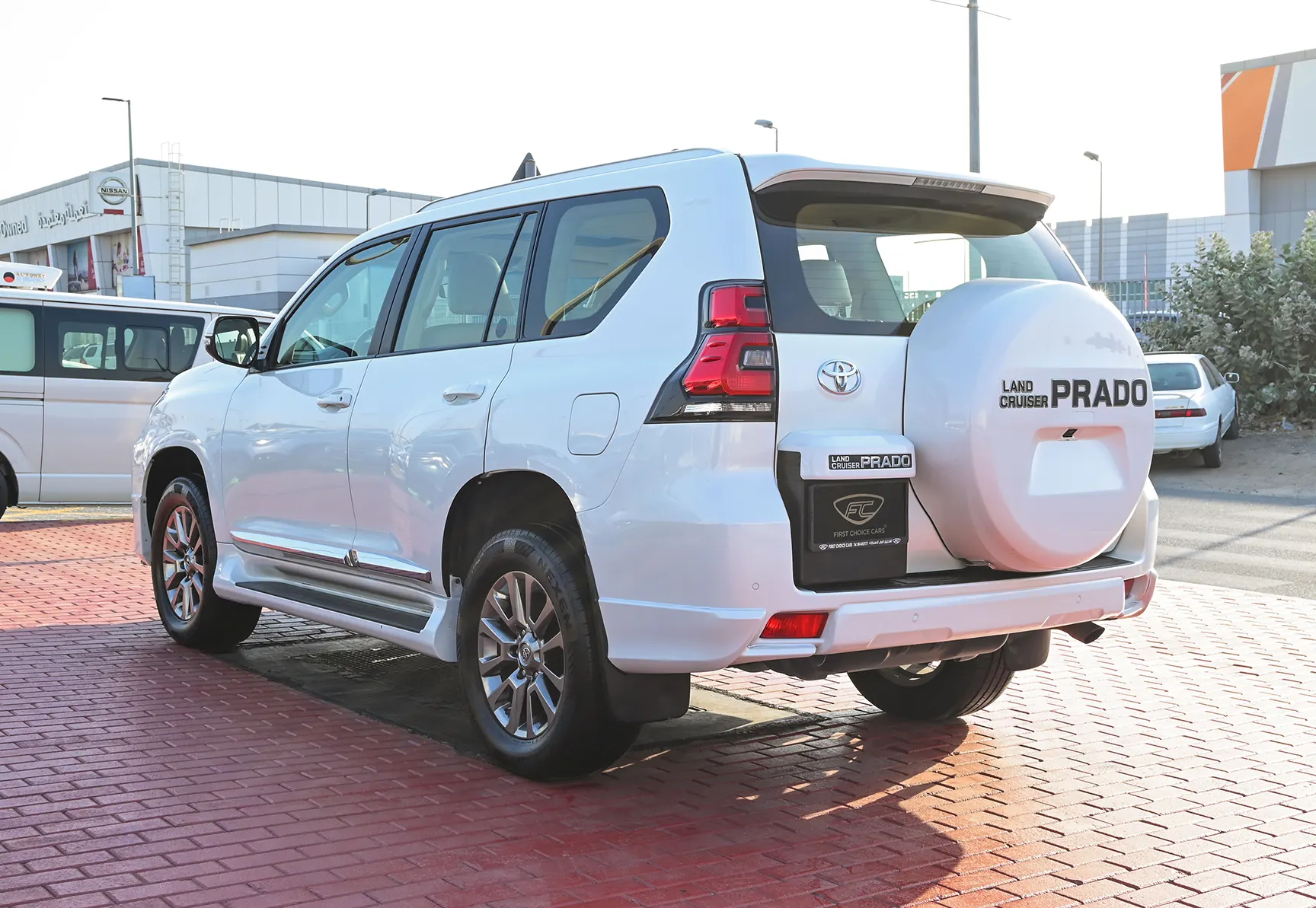Used 2019 Toyota Prado VXR White – Left Back Diagonal (45°) View at First Choice Cars Sharjah