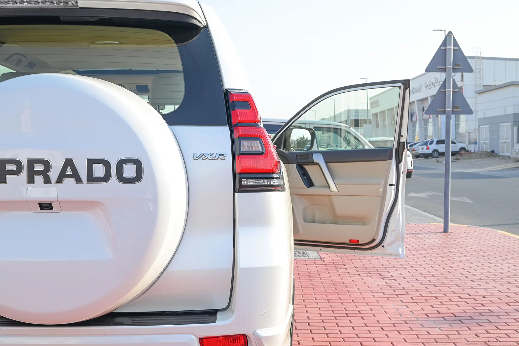 Used 2019 Toyota Prado VXR White – Taillight Close-up at First Choice Cars Sharjah