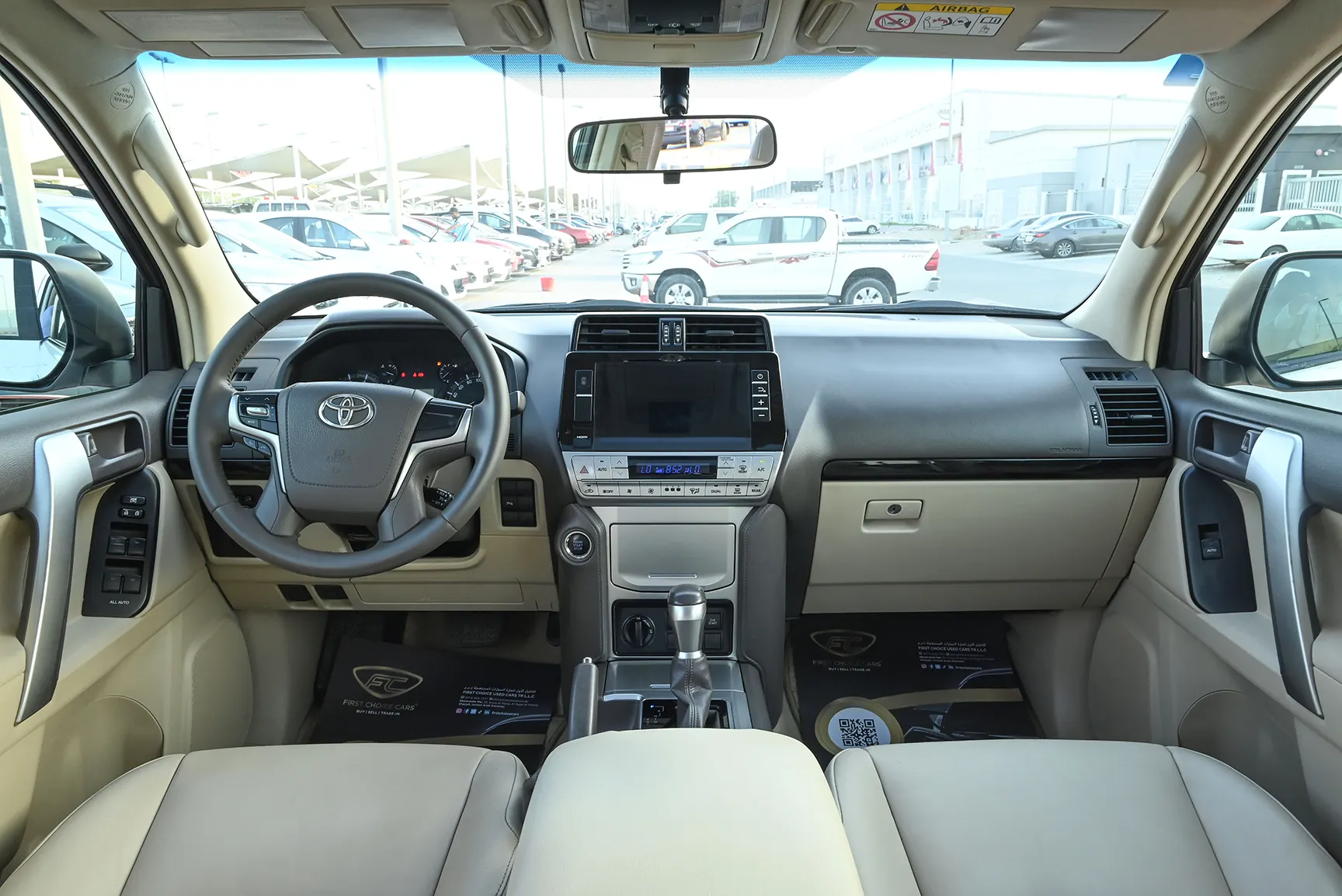 Used 2019 Toyota Prado VXR White – Front Cabin / Dashboard Full View at First Choice Cars Sharjah