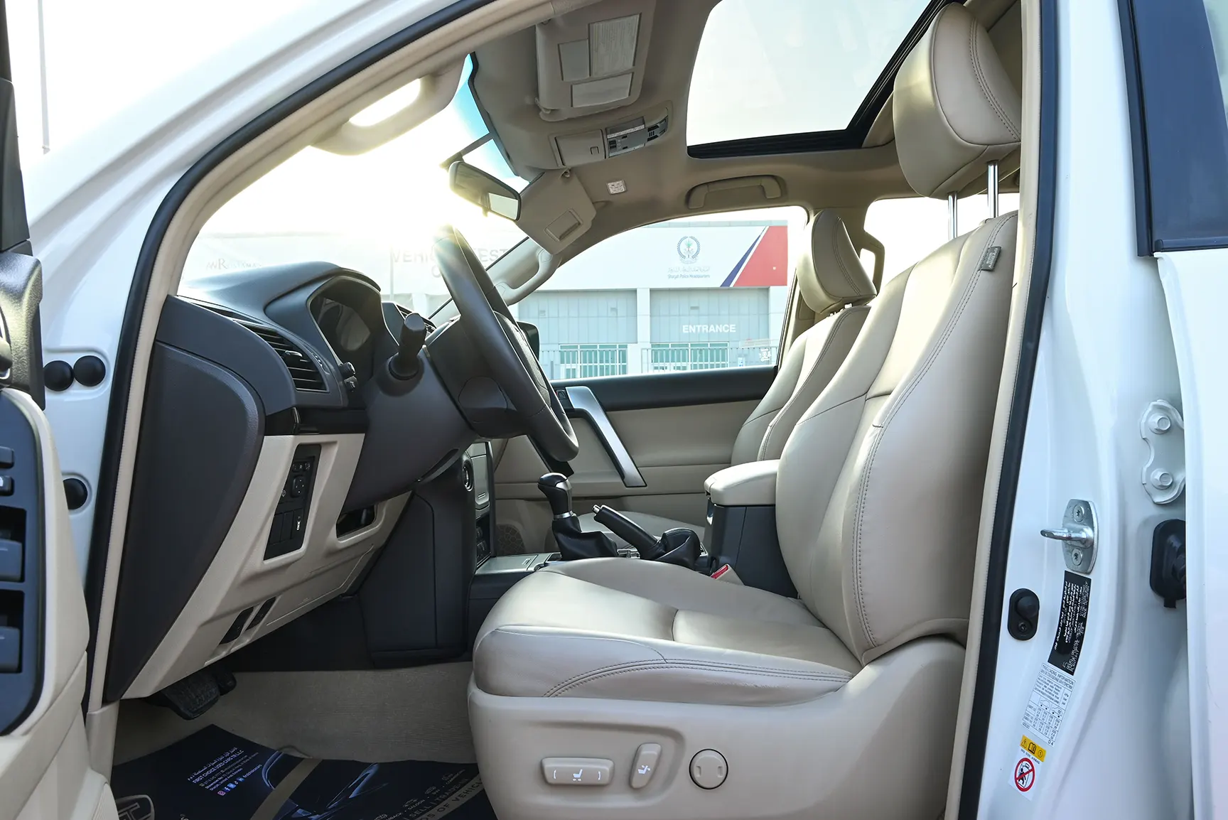 Used 2019 Toyota Prado VXR White – Front Driver Side Cabin View at First Choice Cars Sharjah